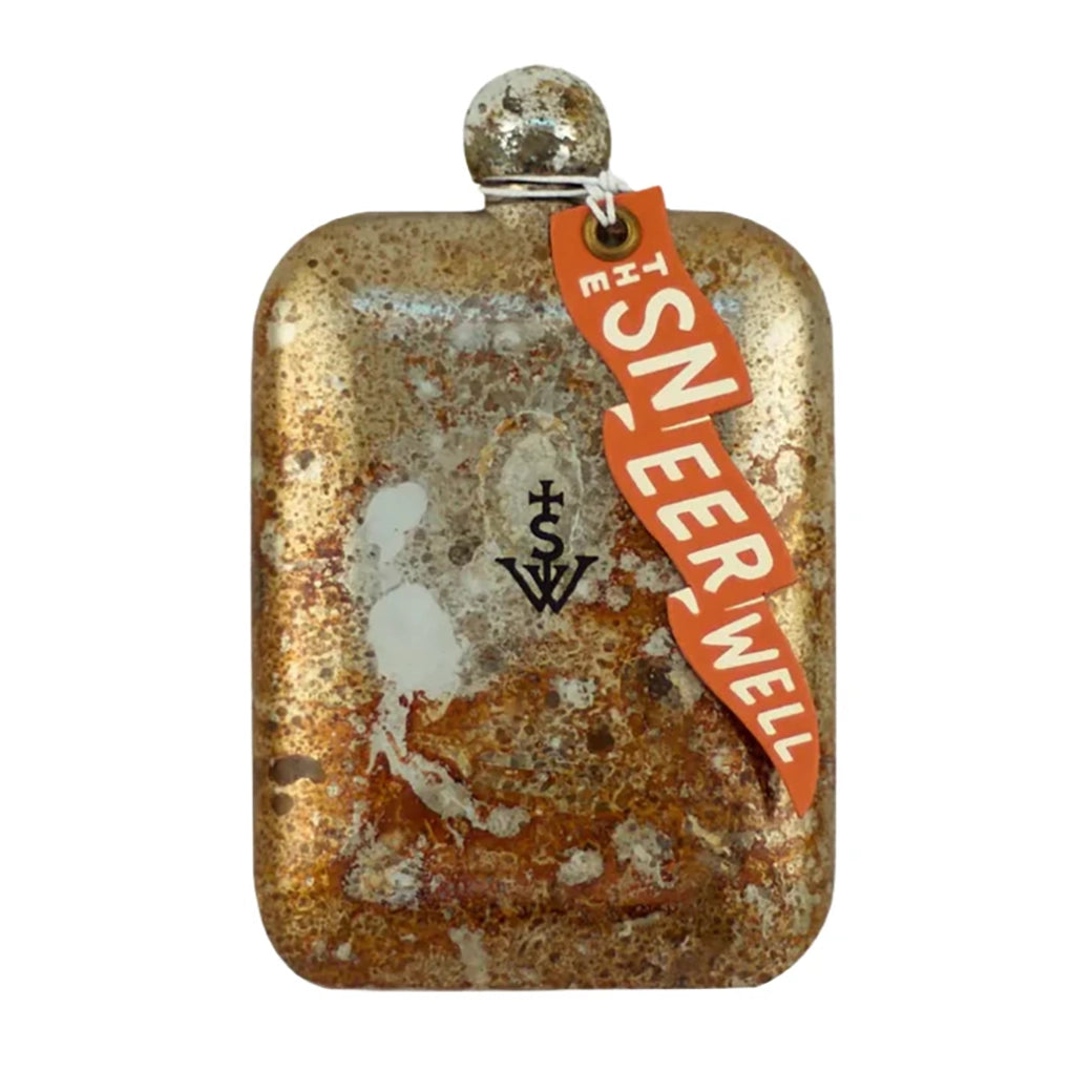 Back of The Sneerwell Eye of Providence whiskey flask showing embossed Sneerwell logo and tag on distressed metal finish – sold by The Simple Man