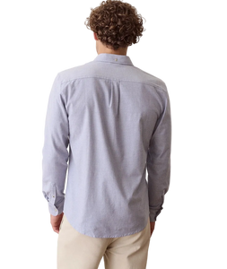 Man wearing Blue Oxford Shirt, back view on model - The Simple Man