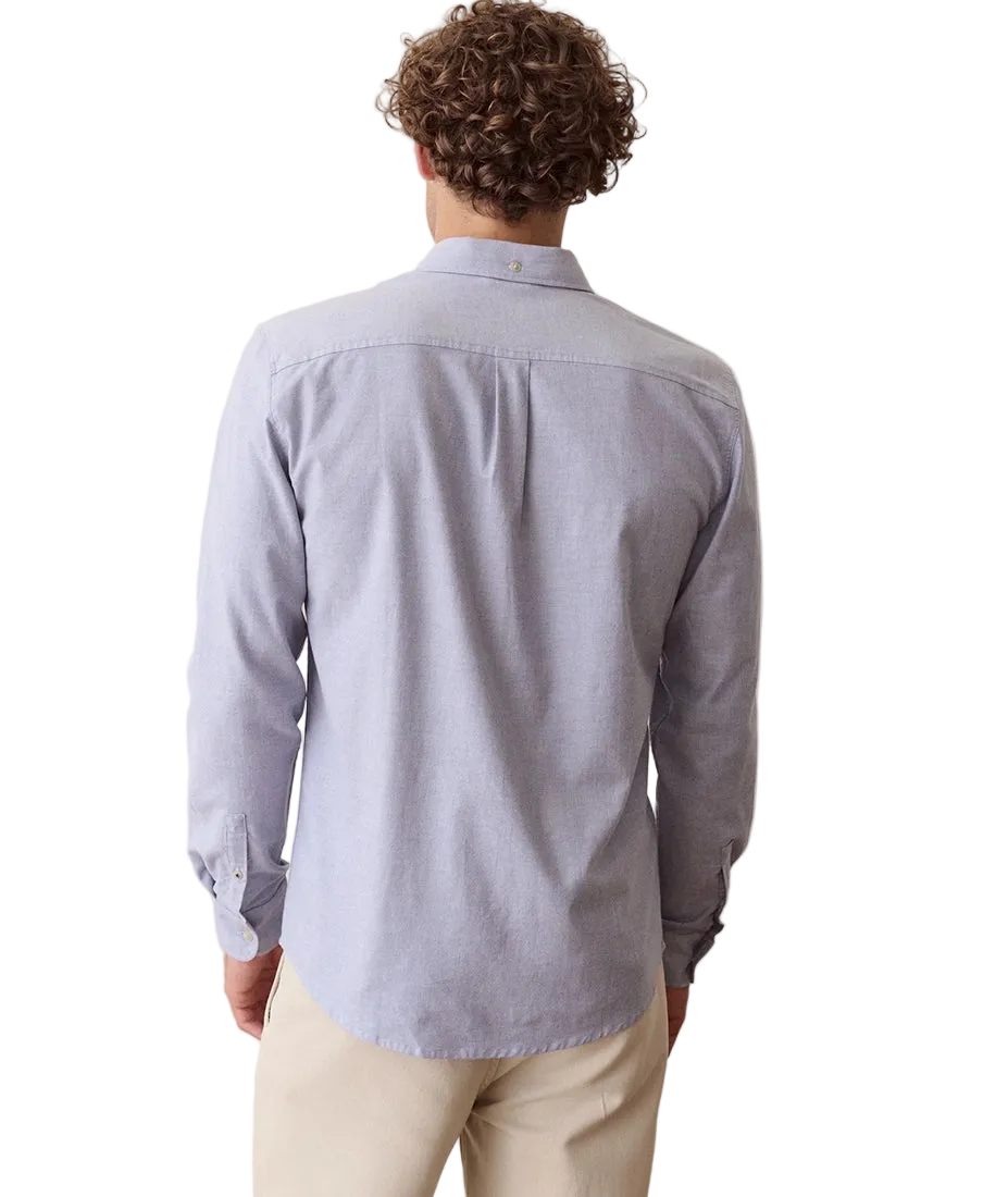 Man wearing Blue Oxford Shirt, back view on model - The Simple Man