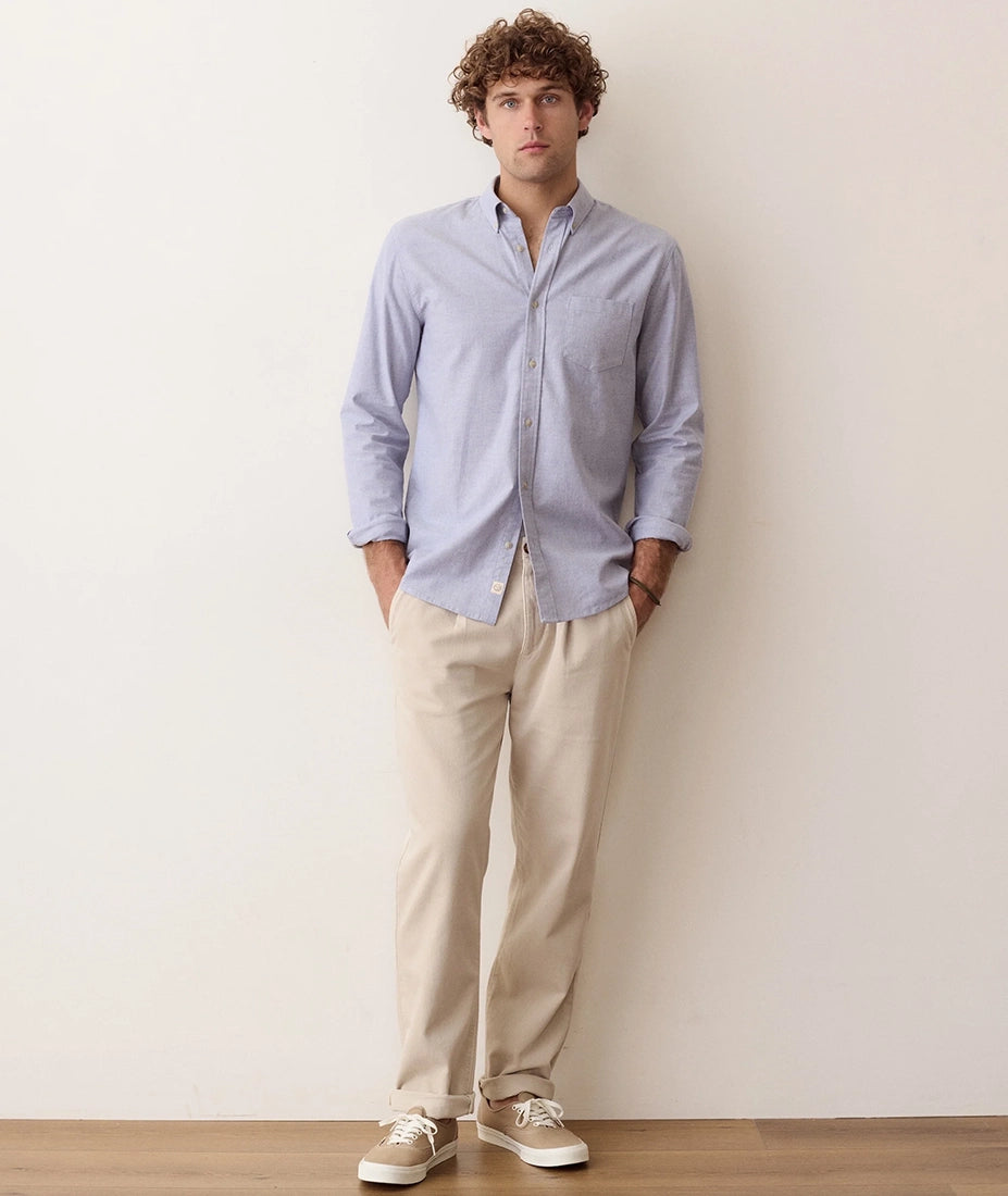 Man wearing Blue Oxford Shirt with tan pants, full body front view - The Simple Man