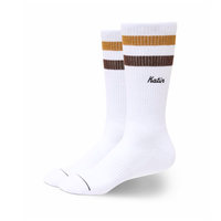Felix Sock in Bluff Cocoa, white crew sock with a gold and brown double stripe at the cuff