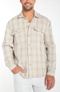 Front view of men’s cotton linen plaid overshirt layered over white t shirt