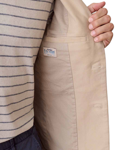 Close-up of Flex Terry Blazer interior tag reading Marine Layer Flex Terry, showing lining and pocket detail - The Simple Man