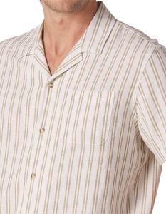 Model Wearing The Normal Brand Freshwater Camp shirt, in agave Stripe, front close up fabric detail view