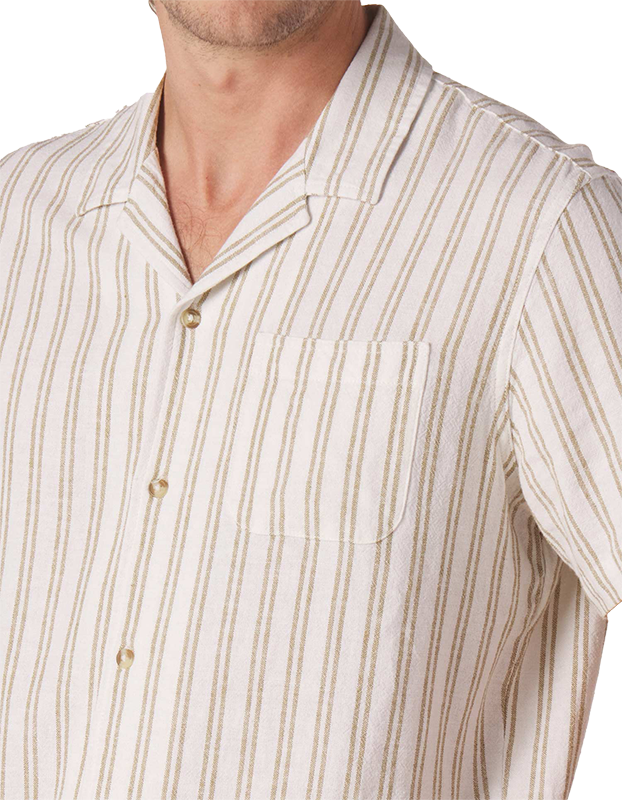 Model Wearing The Normal Brand Freshwater Camp shirt, in agave Stripe, front close up fabric detail view