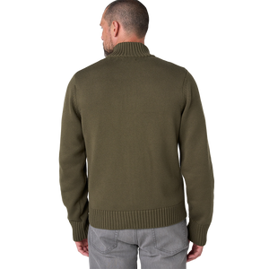 Back view on model of the olive textured knit sweater showing the tall collar and ribbed hem