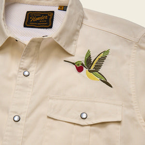 Hummingbird embroidery detail on Western snap shirt