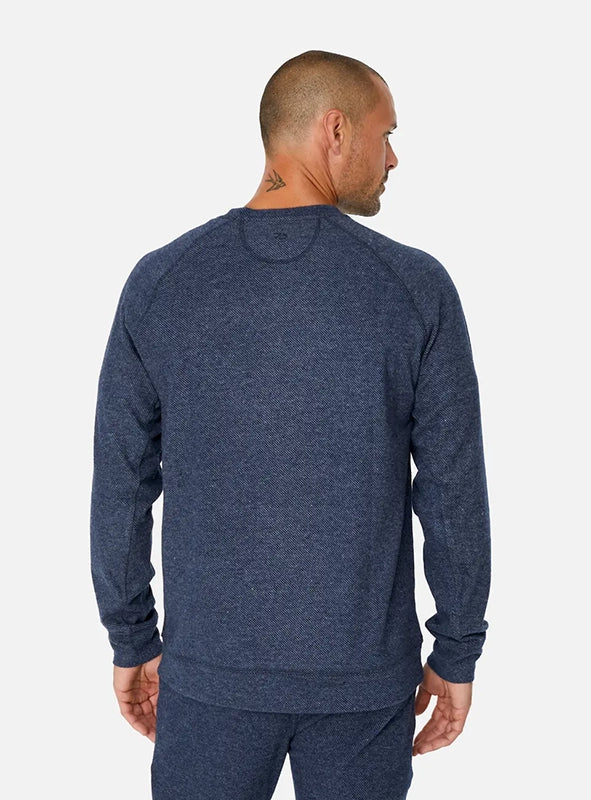 Model Wearing Generation Crewneck sweatshirt in navy color, rear view