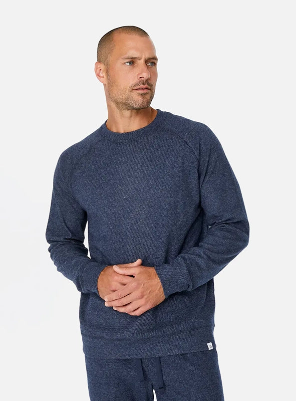 Model Wearing Generation Crewneck sweatshirt in navy color, front view