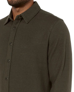 Detailed view of Generation Solid Shirt collar, buttons, and shoulder seam in olive green