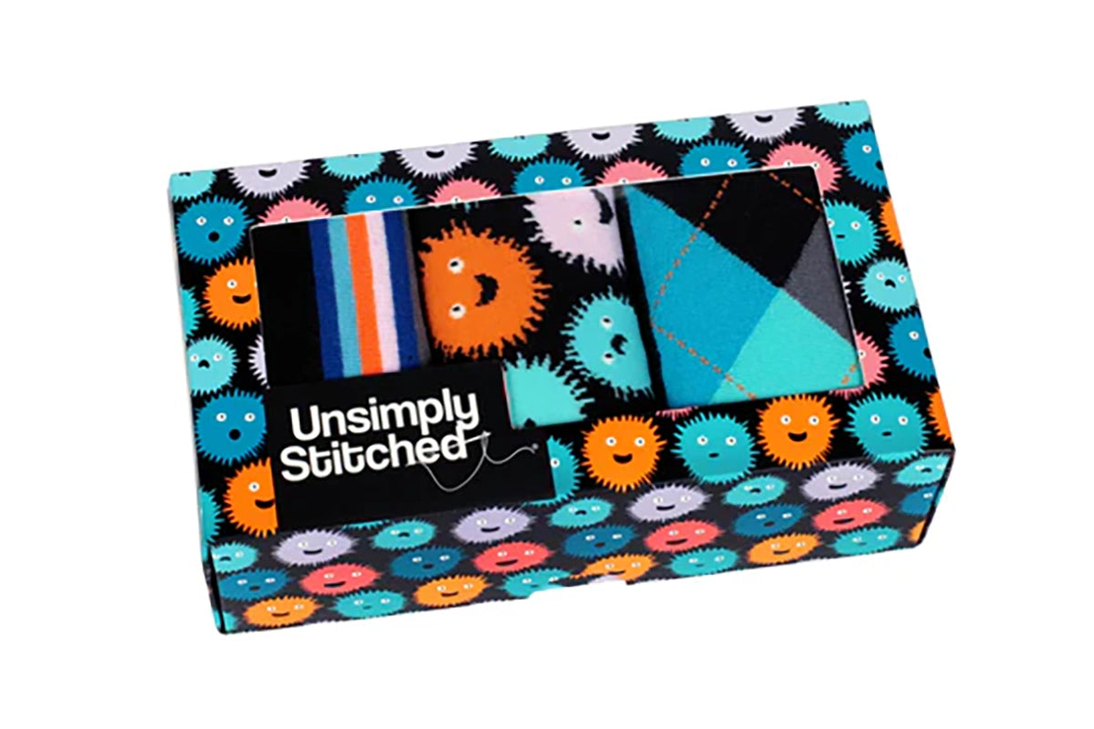 Puffer Fish sock gift box by UnsimpIy Stitched showing three colorful men’s crew socks inside patterned packaging at The Simple Man