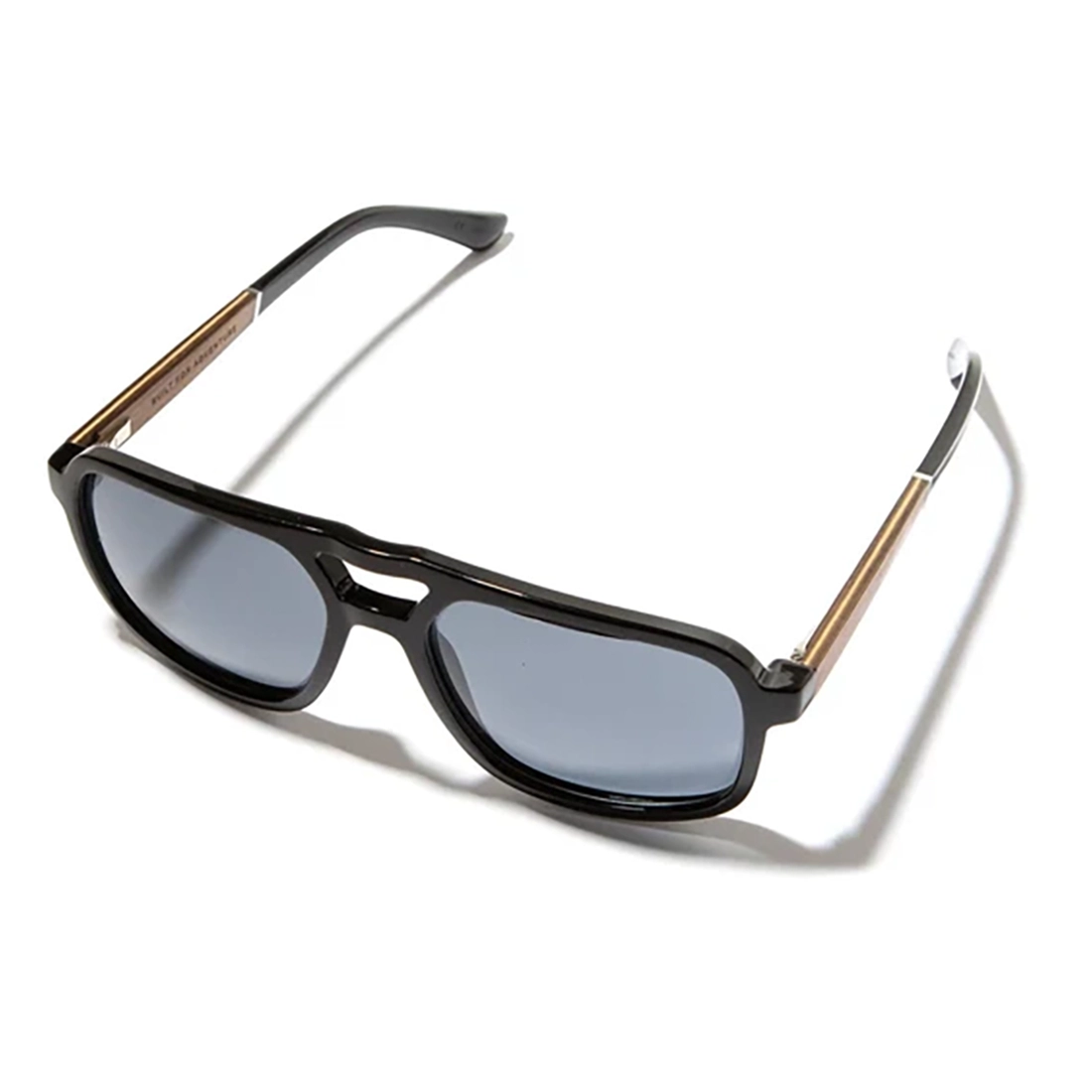 Sunglasses with black frame and blue lenses on a white background