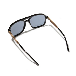Sunglasses with black frame and blue lenses on a white background