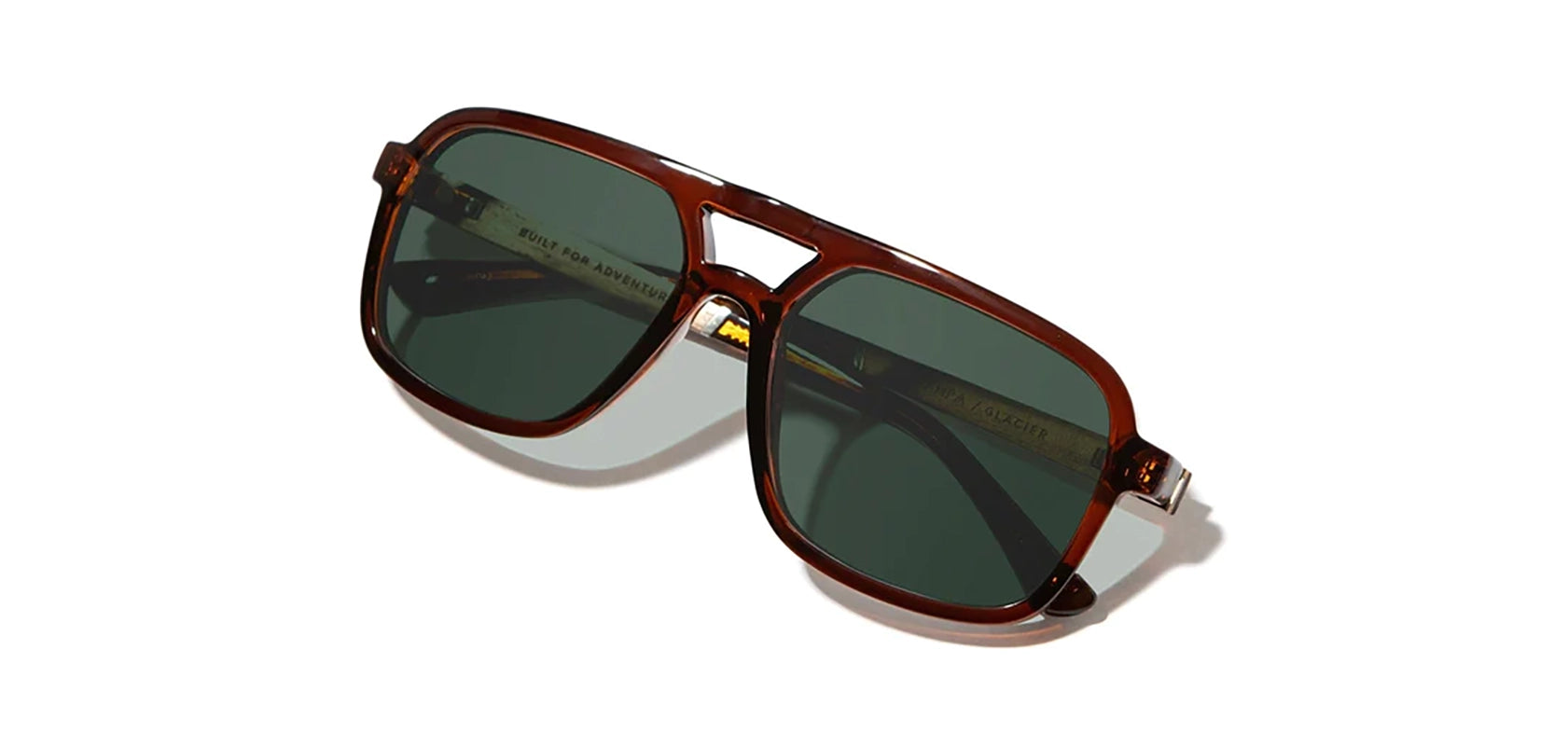 Camp Glacier Sunglasses in Clay & walnut frames, with Grey G15 polarized lenses, front angled closed temple view