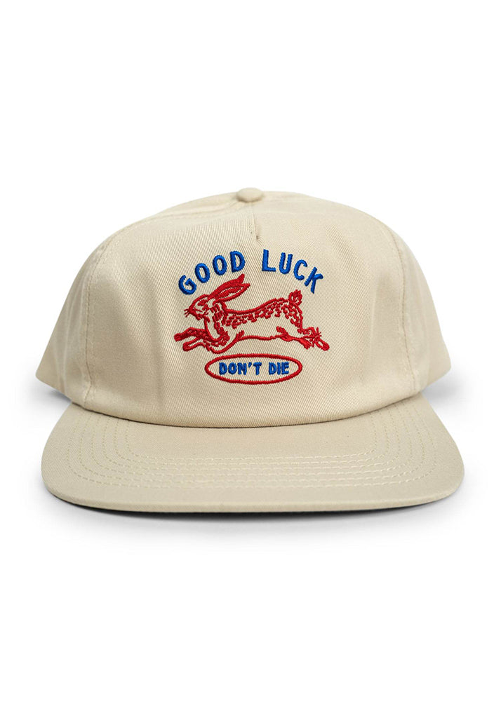 Good Luck cotton twill hat in tan with embroidered graphic