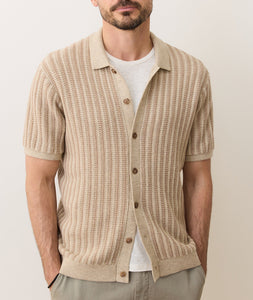 Model wearing Graham Sweater Button Down with hands in pockets, highlighting natural drape and button-through front