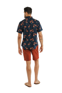 Bridge & Burn Grant Slim Shirt Wildflower Navy – back view on model wearing men's slim fit modal floral button down shirt with rust shorts