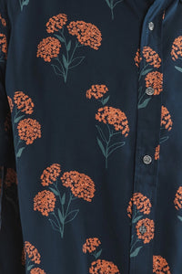 ridge & Burn Grant Slim Shirt Wildflower Navy – close-up of rust orange wildflower print on navy modal fabric with button placket detail