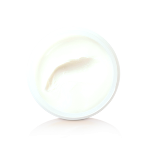 Open jar of white Gravity Paste, close detail from above