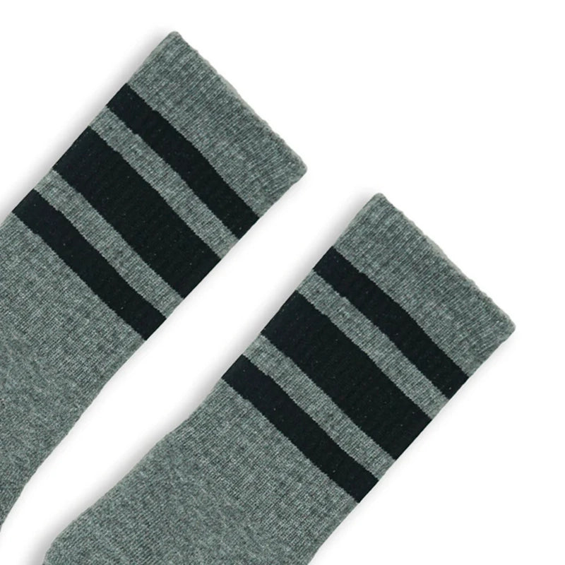 Socco Atheletic socks in weathered grey with black stripes close up view