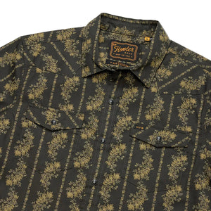 Close-up of collar and chest pockets on the black and olive floral stripe Grampa's Curtains H Bar B Snapshirt showing the Howler Bros label -- The Simple Man