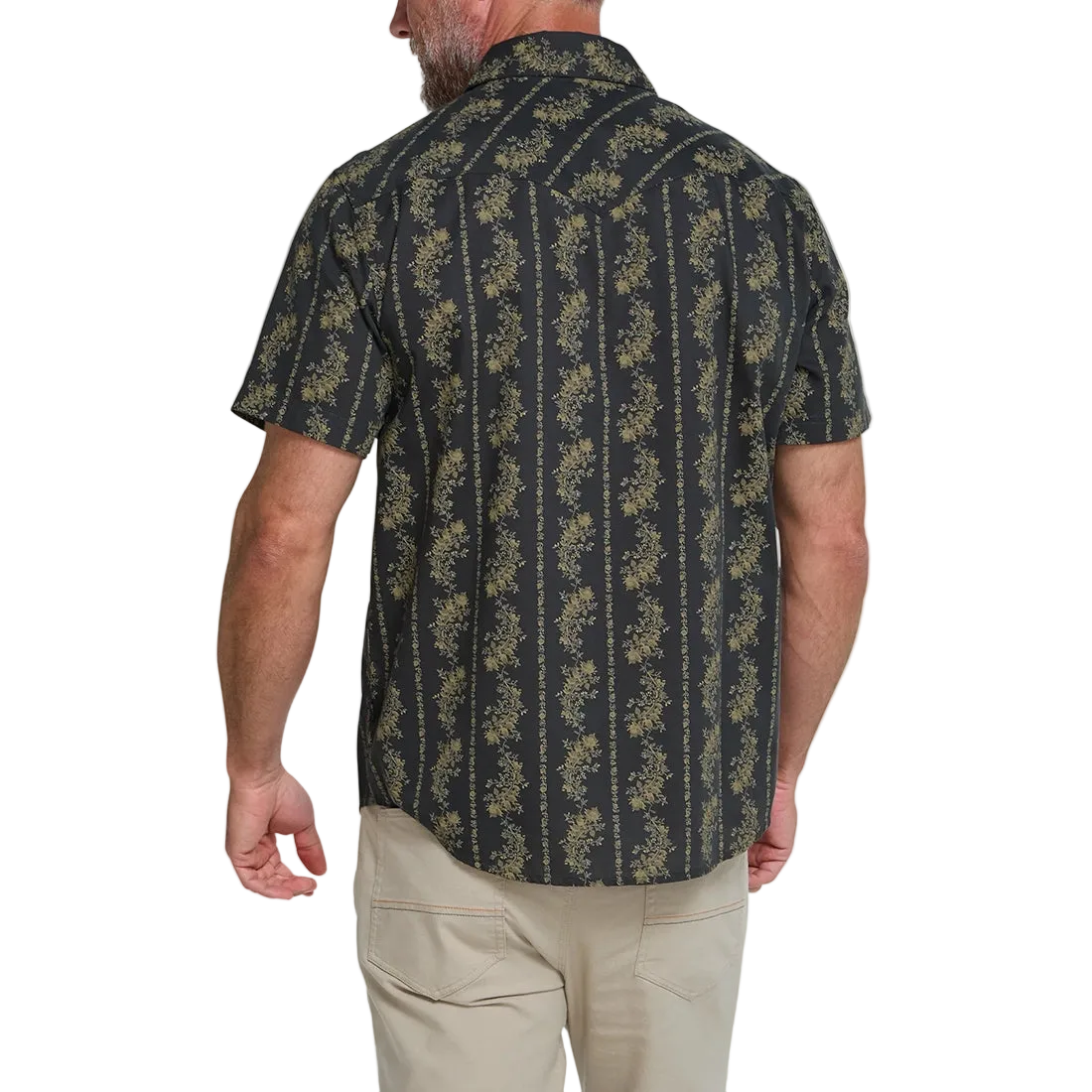 Back view of man wearing the black and olive floral stripe Grampa's Curtains H Bar B Snapshirt, short sleeve western snap shirt -- The Simple Man