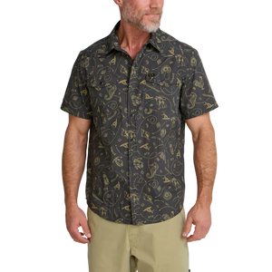 Man wearing Howler Bros H Bar B Snapshirt Sea Rodeo front view – gold on charcoal all-over print western snap shirt regular fit with chinos