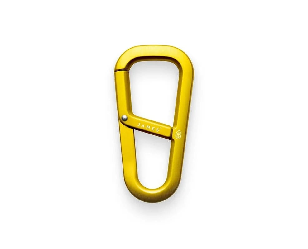 Bright yellow anodized aluminum carabiner clip with secure keyring design from The Simple Man