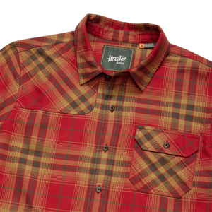 Collar, Howler Bros neck label and metal-button flap pocket on the Brick Harker's Flannel, detail view, The Simple Man