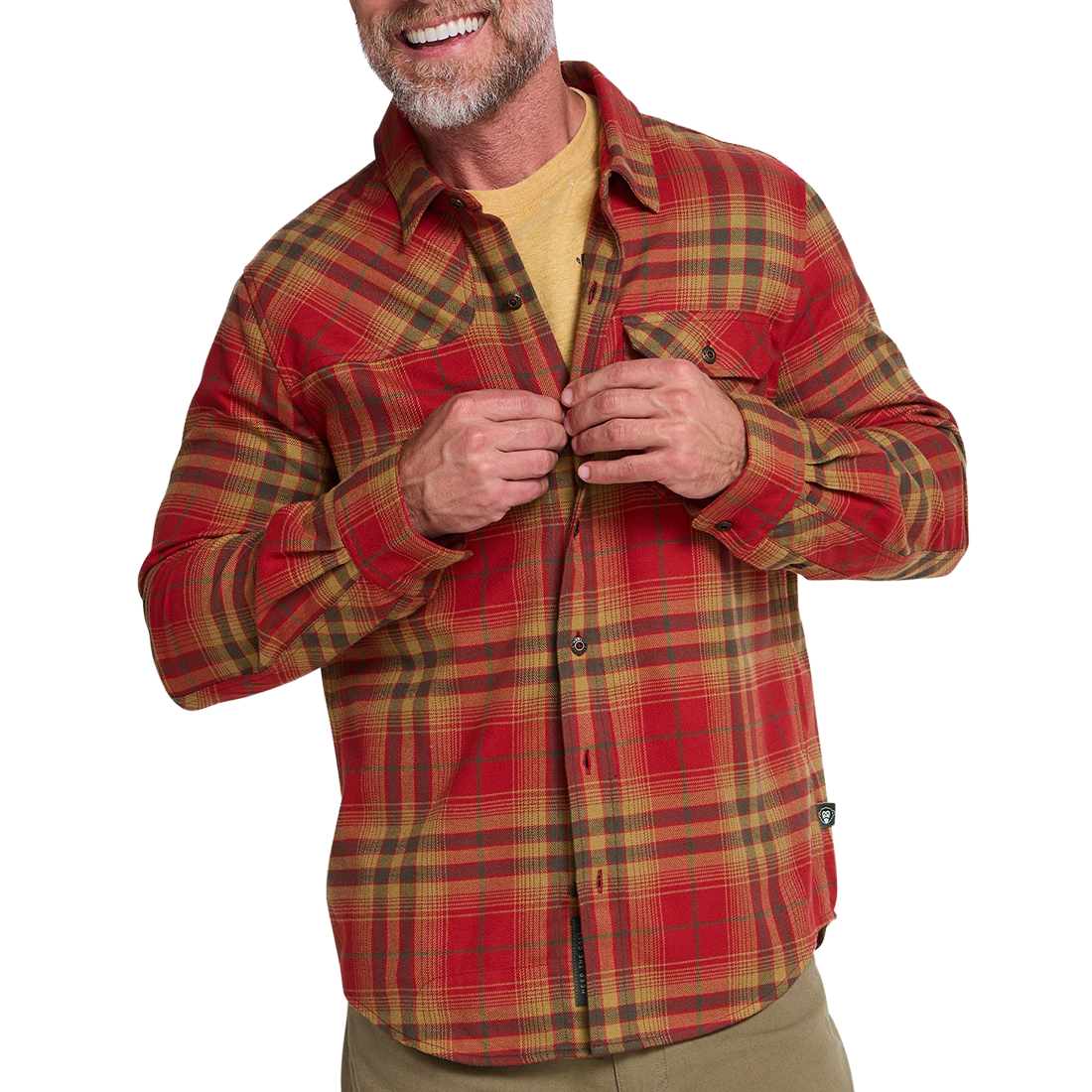 Man in sunglasses wearing the Kempton Plaid Brick Harker's Flannel outdoors by green shrubs, lifestyle shot, The Simple Man