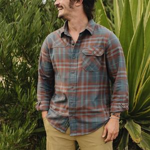 Man wearing the Kempton Plaid Dark Slate Harker's Flannel outdoors with sleeves rolled, The Simple Man