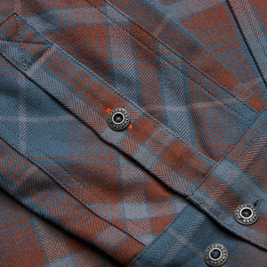 Brushed herringbone weave and Howler Brothers metal button on the Dark Slate Harker's Flannel, detail view, The Simple Man