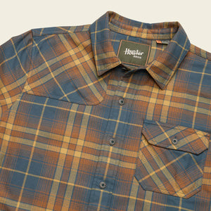 detailed flat lay of Harker’s Flannel Shirt by Howler Brothers with left chest pocket, hunter's yoke, and signature Howler embroidery