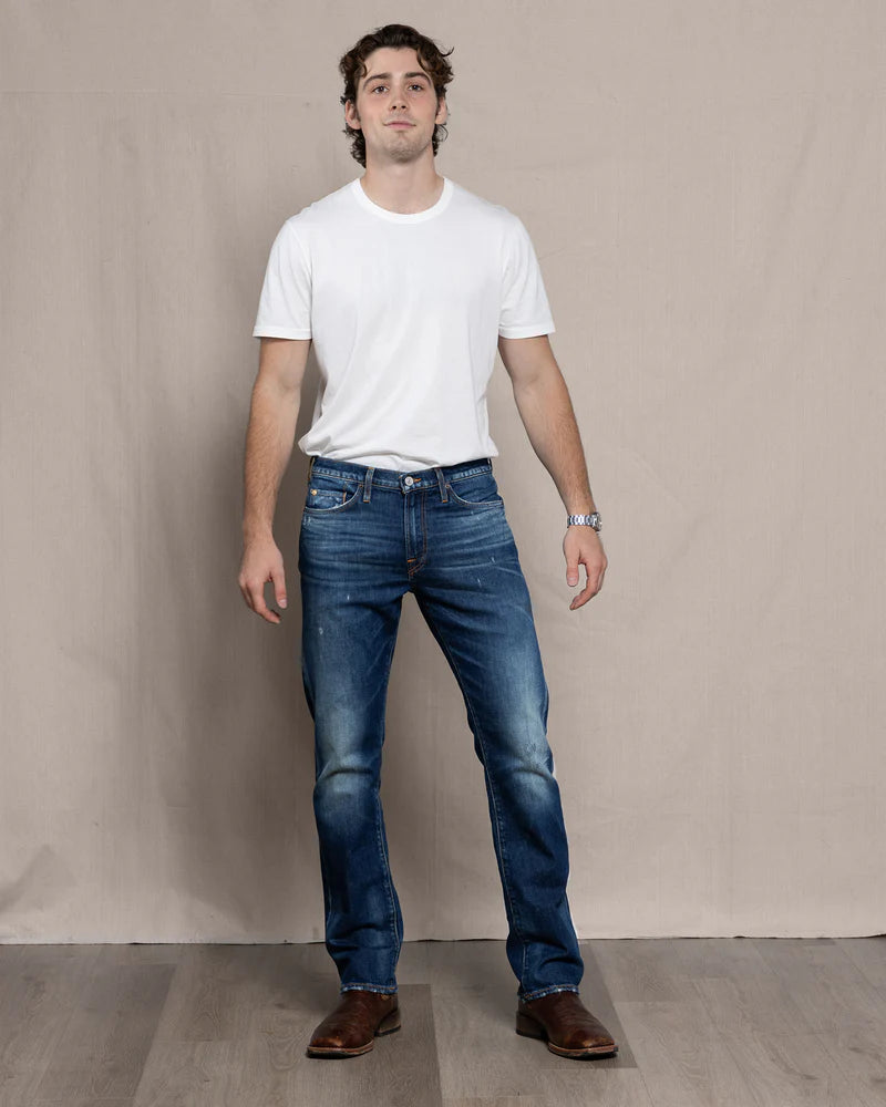 Full front view of model wearing Harlan Straight Easy Rider jeans in medium-dark Italian denim.