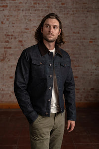 Model wearing Harris selvedge denim jacket front angle