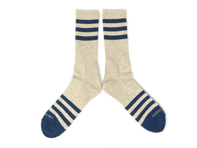 Men’s heather oatmeal socks with navy stripes laid flat