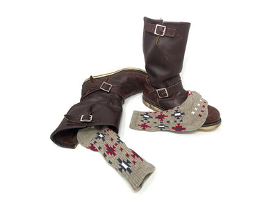 Men’s heather cotton socks with southwestern pattern worn with brown leather boots