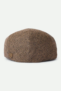 Brixton Hooligan Snap Cap back view on white background – brown khaki herringbone flat cap with metal crest pin snap closure