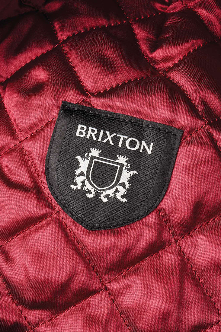 Brixton Hooligan Snap Cap interior close-up – burgundy satin custom liner with Brixton brand label brown Khaki herringbone flat cap