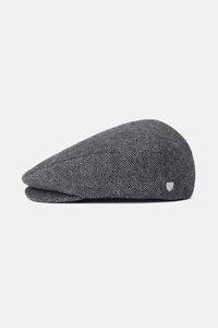 rixton Hooligan Snap Cap side profile on white background – grey black herringbone structured flat cap short brim elevated crown men's accessory