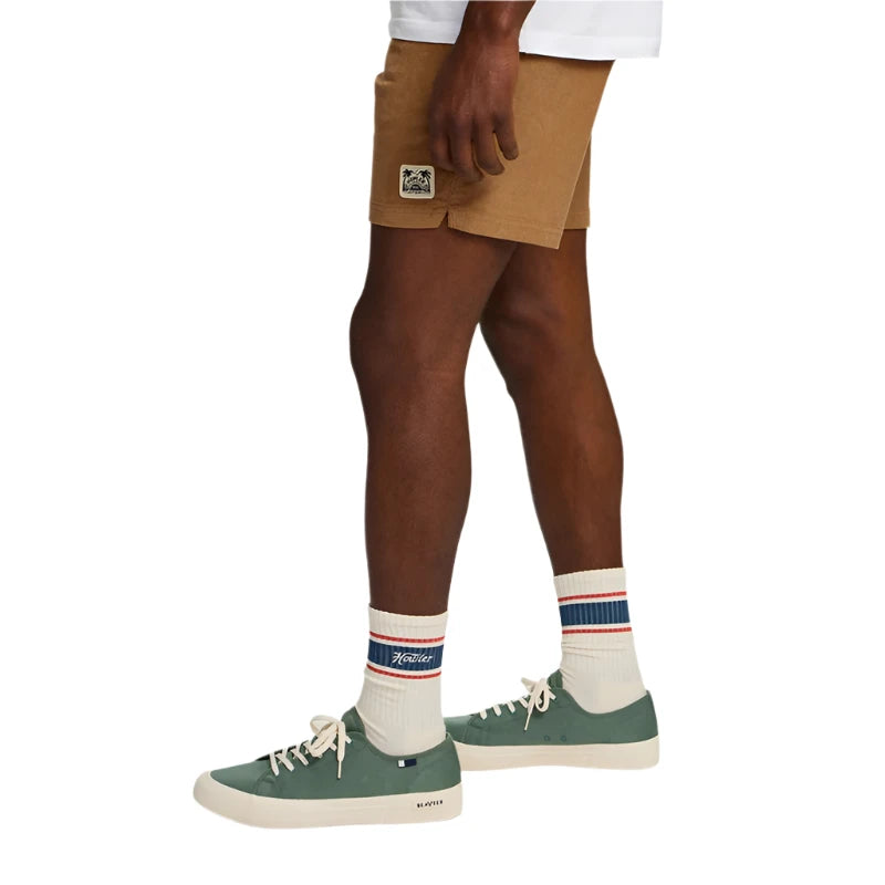 Model Wearing Howler Brothers Howler Script Socks in White 