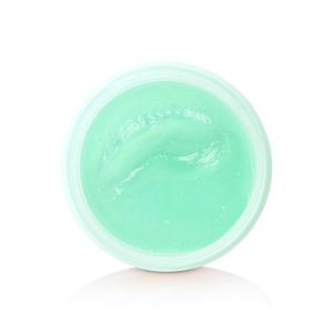 Open jar of seafoam-green Hybridized Wax, top-down detail