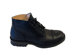 Legendflex cap-toe boot in black leather on a stitched rubber sole, The Simple Man