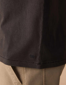 he Normal Brand Jersey Henley hem detail close-up – TNB embroidery blind hem stitch 100% cotton shadow charcoal men's short sleeve henley