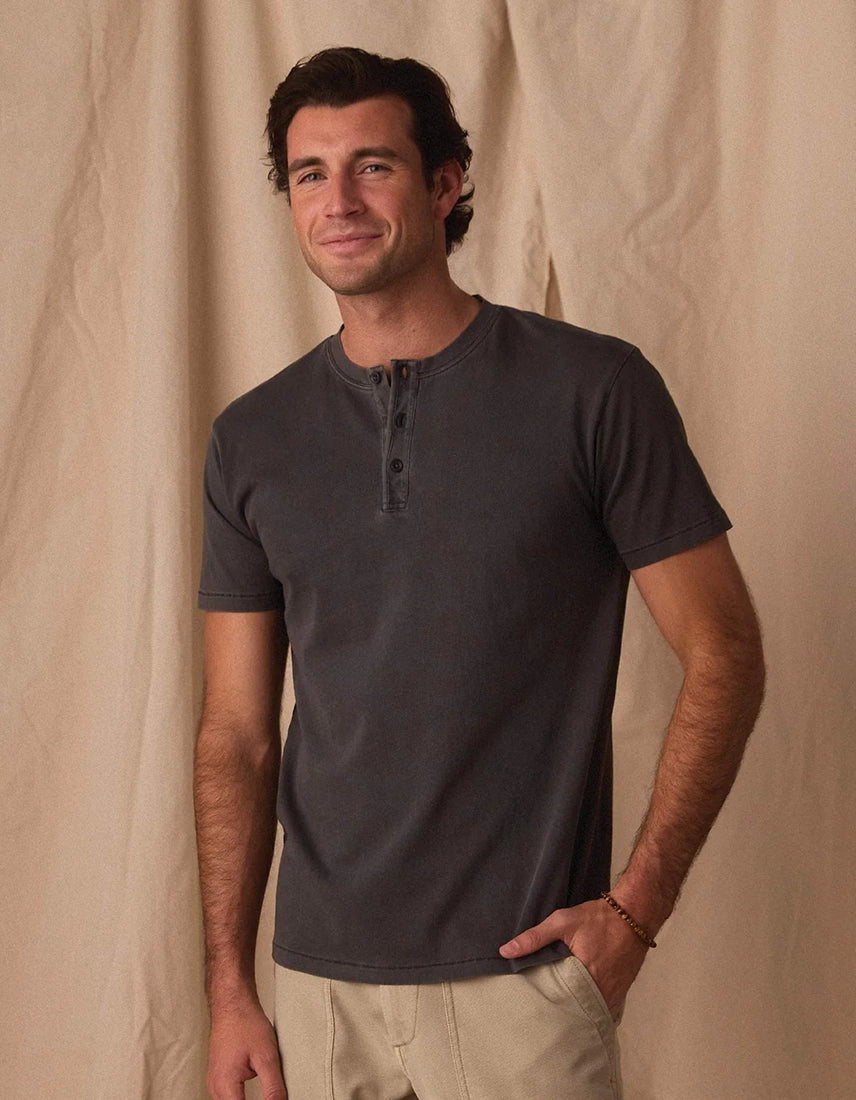 Man wearing The Normal Brand Shadow Jersey Henley front view smiling – 100% cotton short sleeve 3-button henley true to size men's everyday shirt