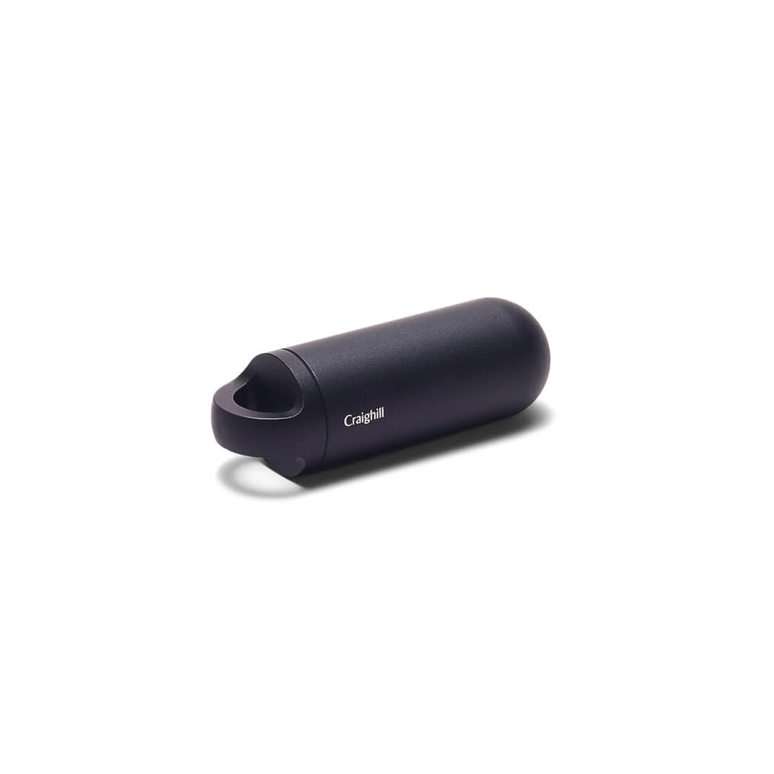 Black Key Capsule with loop end, angled view - The Simple Man