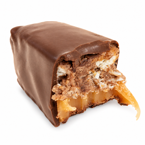 Cutaway of a Kitchen Sink mini chocolate bar showing peanut butter, pretzel, crispy rice and caramel inside a dark chocolate coat, The Simple Man