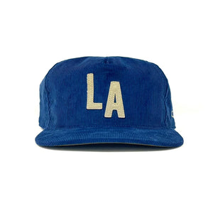 Los Angeles blue corduroy snapback hat with cream LA letter patch, flat brim, front view – The Simple Man