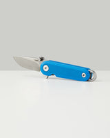 Blue G10 Lark lightweight folding knife shown open on white background