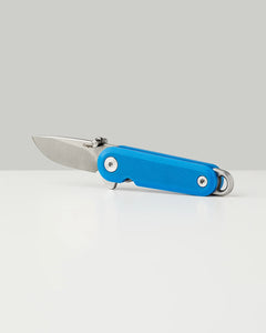Blue G10 Lark lightweight folding knife shown open on white background